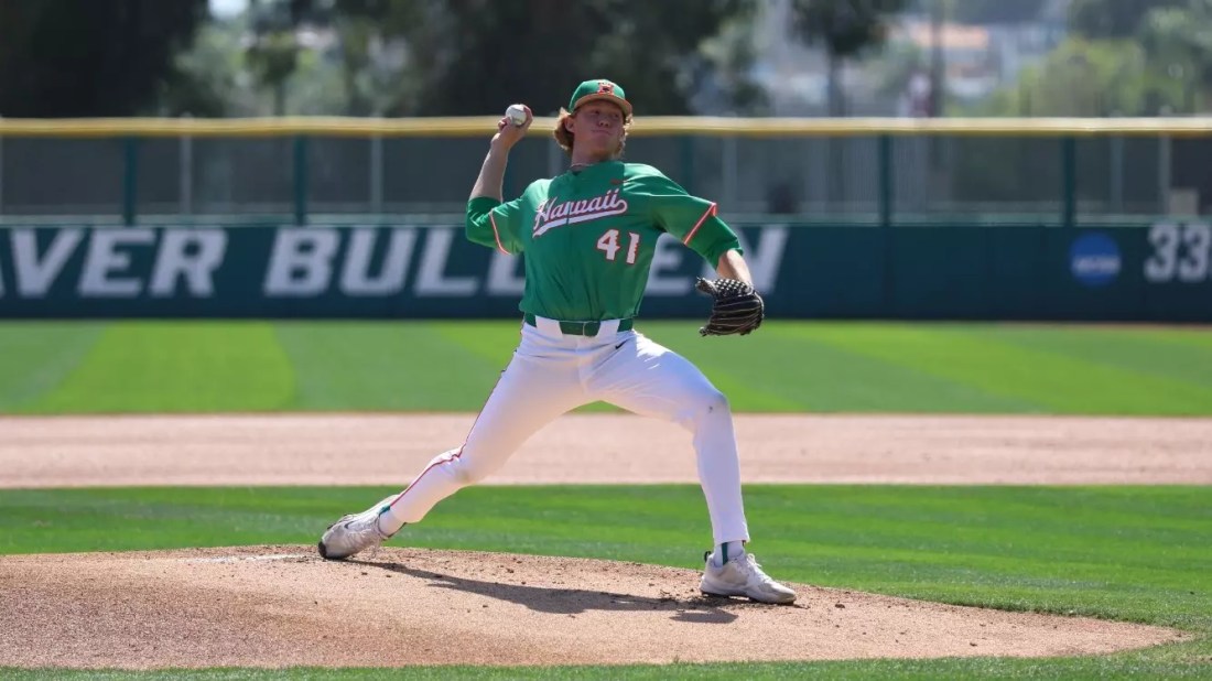 Liam O'Brien, in his green #41 throwback jersey, delivers a pitch.
